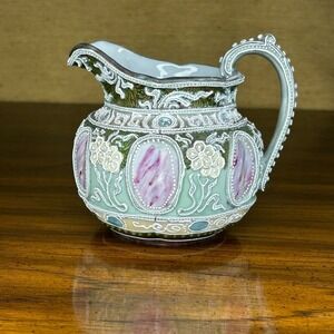 Antique Moriage Satsuma small porcelain pitcher with floral motifs
